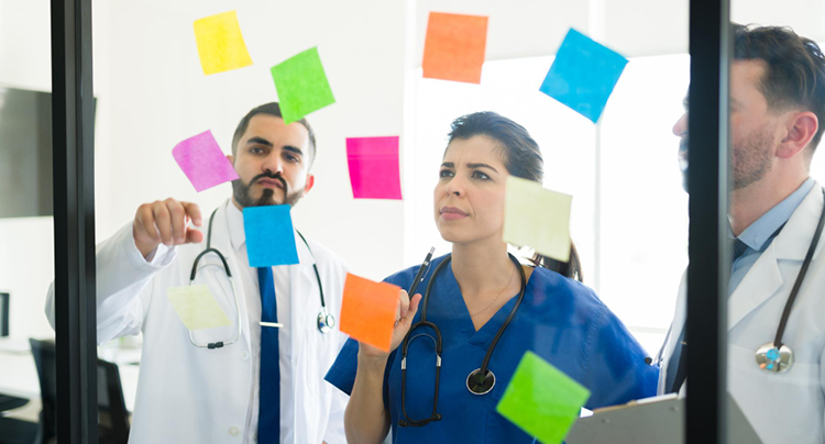 Healthcare professionals developing personalized care plan